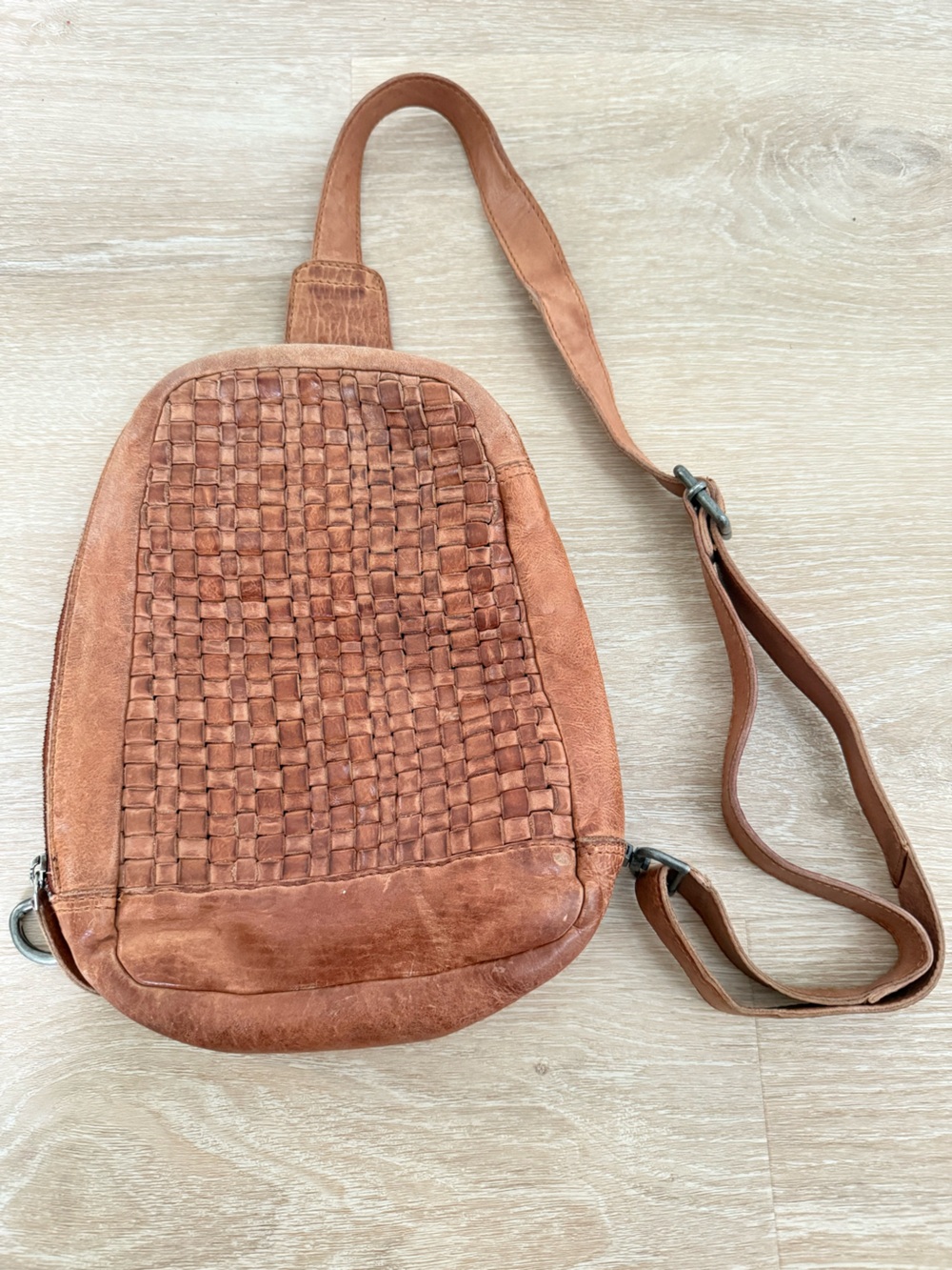 Vilenca Holland woven brown leather sling backpack